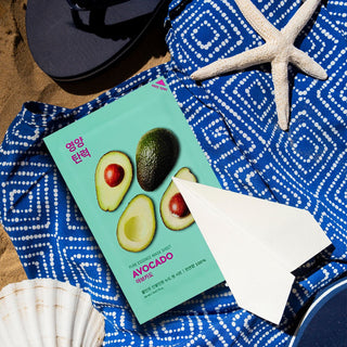 Eine Maske auf einem Baumwollsaum mit Avocado-Extrakt Pure Essence Holika Holika - 2